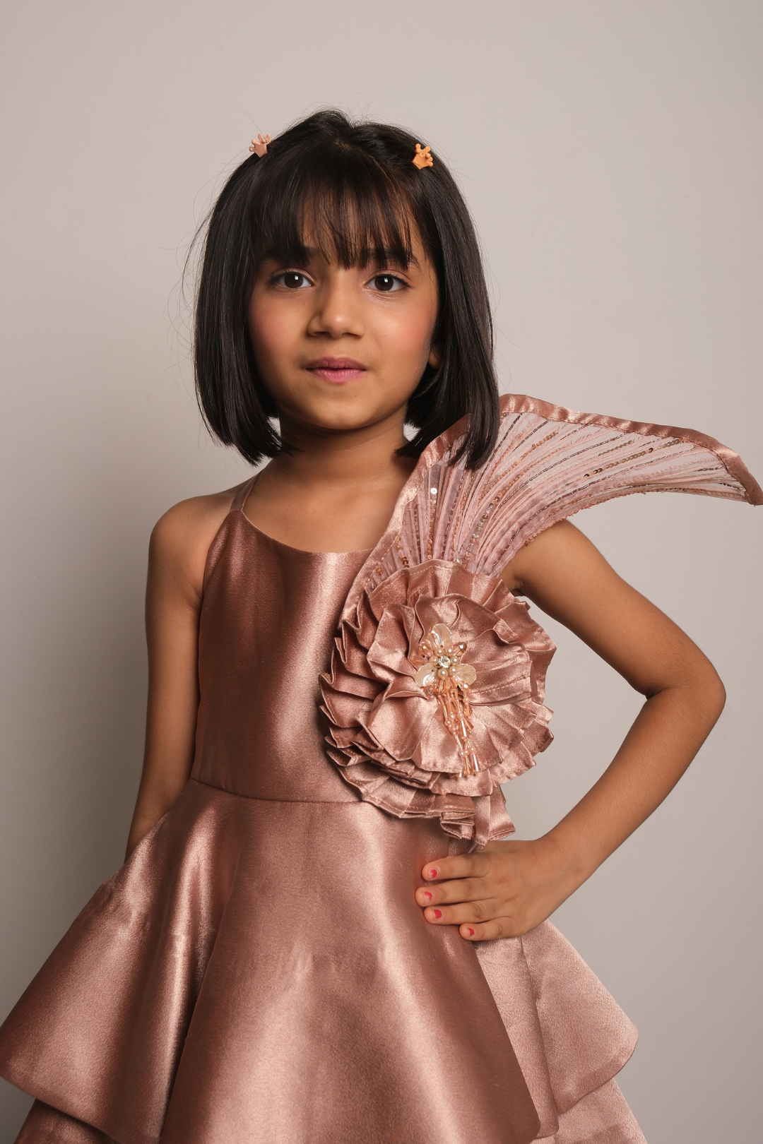 Girls' Rose Gold Satin Party Dress with Layered Hem & Statement Shoulder Detail